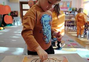 Zajęcia koleżeńskie "Na dyniowej grządce" w grupie II i VII